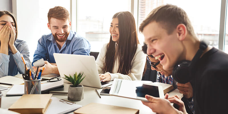 team-members-laughing